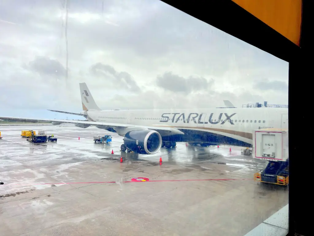 STARLUX Airlines aircraft preparing for boarding at Terminal 1 of Taiwan Taoyuan International Airport
